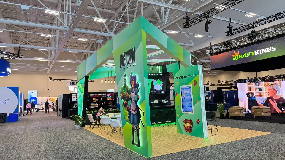Corner view of the arch with a backlit character cut-out and neogames studio touch screen