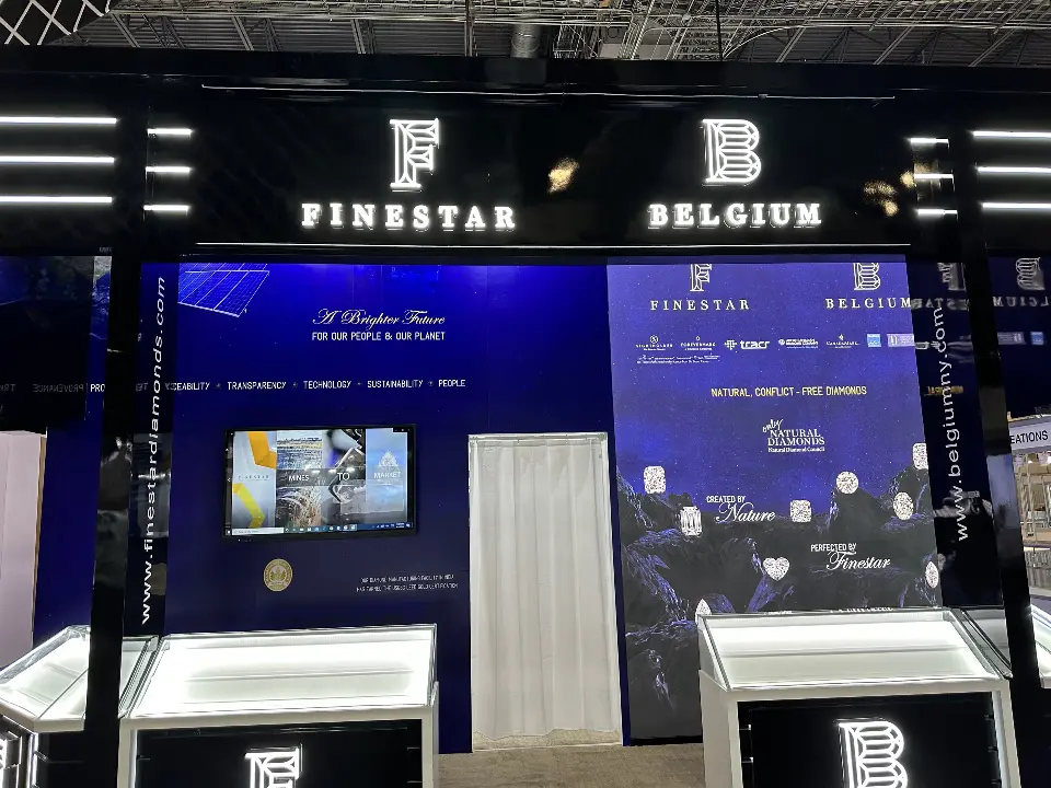Straight-on view of the F and B fascia above glowing white jewelry showcases