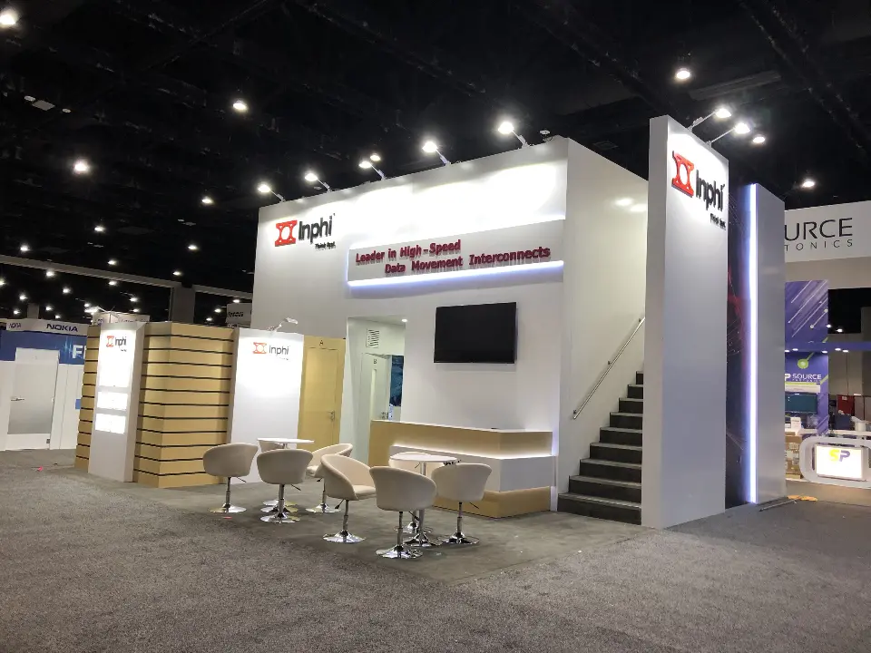 Wider finished view of Inphi structure with lit header band and black staircase