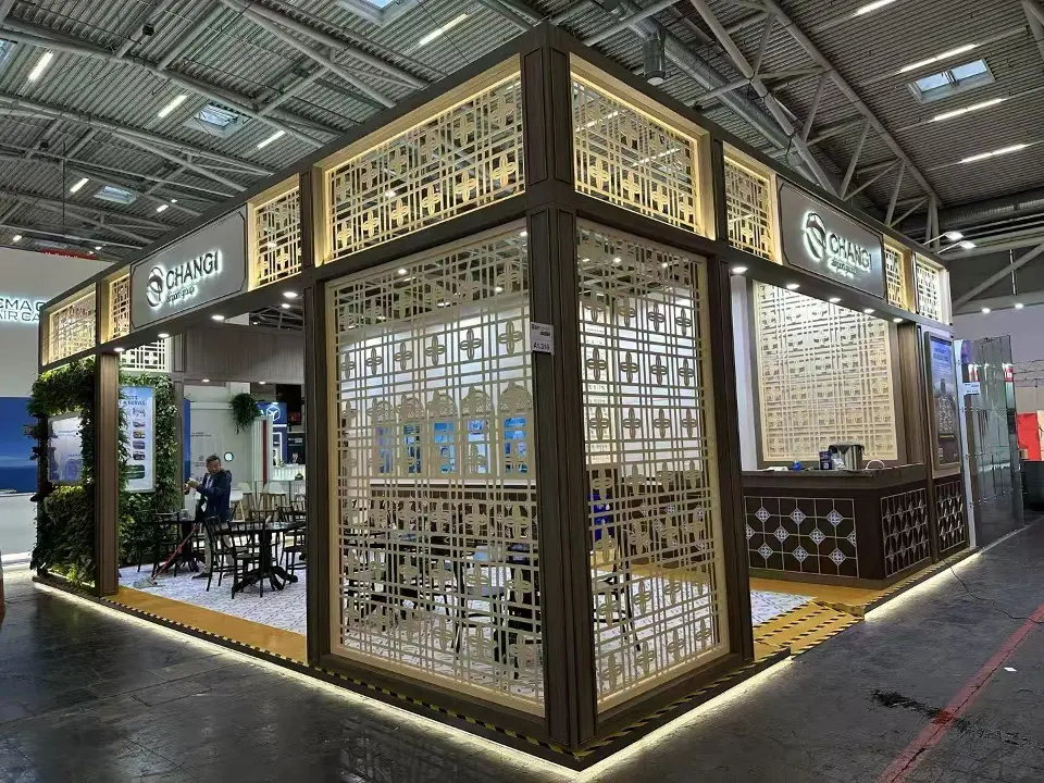 Changi stand corner with wood-look lattice screens and dark patterned lower panels