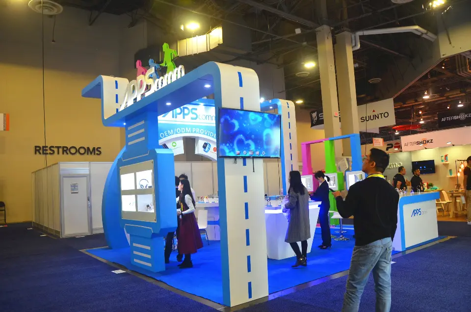 Side view of the booth near the hall restroom sign