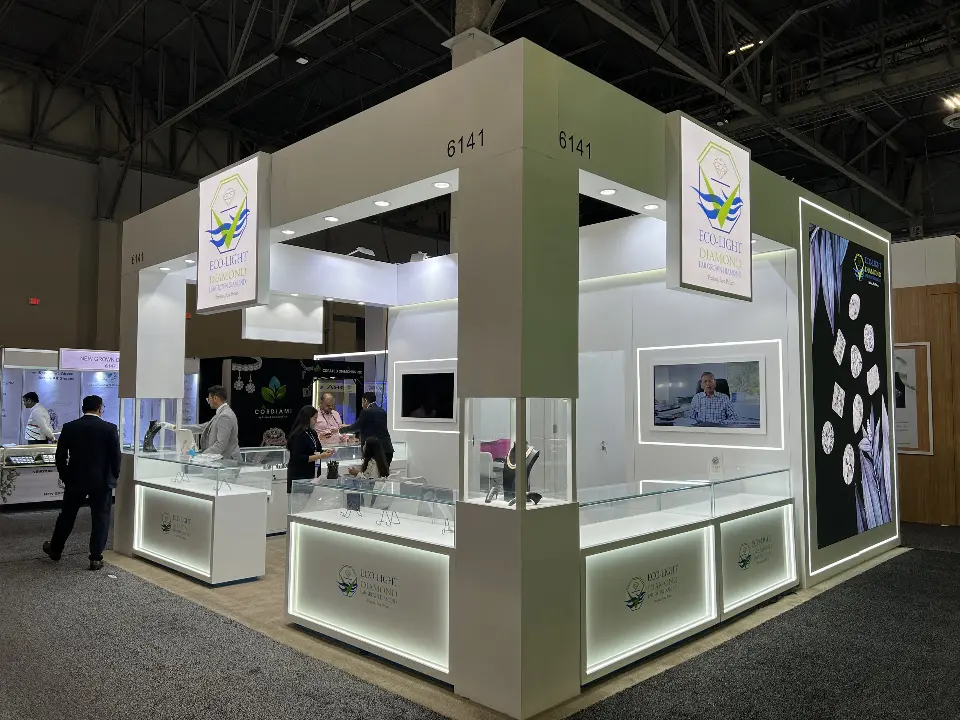 Eco-Light Diamond island booth 6141 with lightbox logos, lit showcases and tall diamond graphic wall