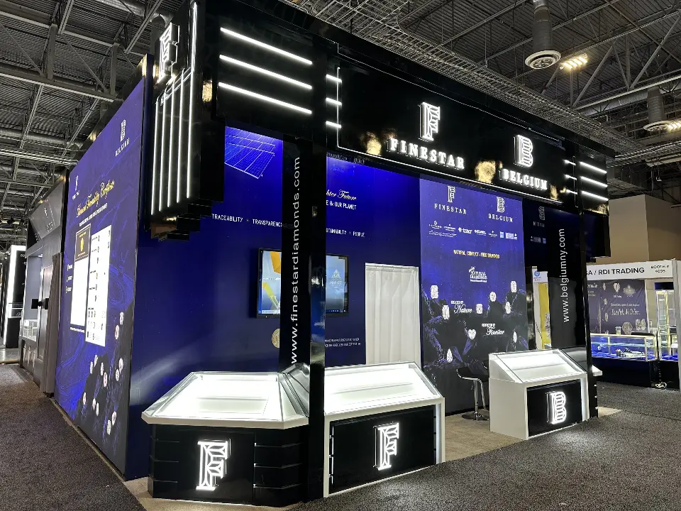 Corner angle with B monogram plinth and glowing white showcases