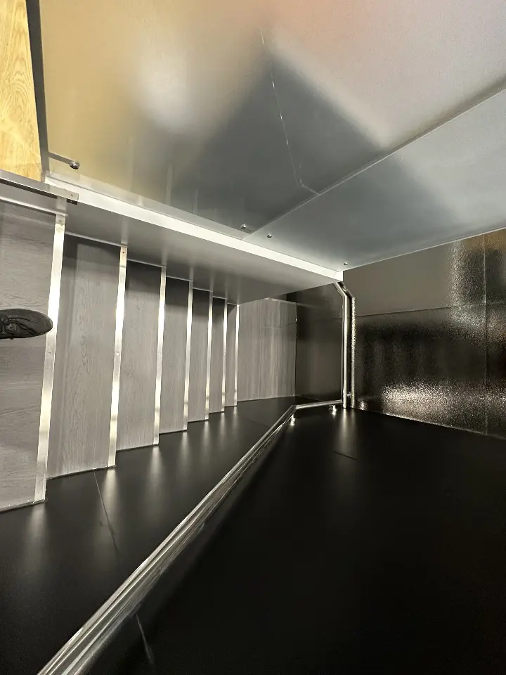 Close view of the glass balustrade with black frame and white trim