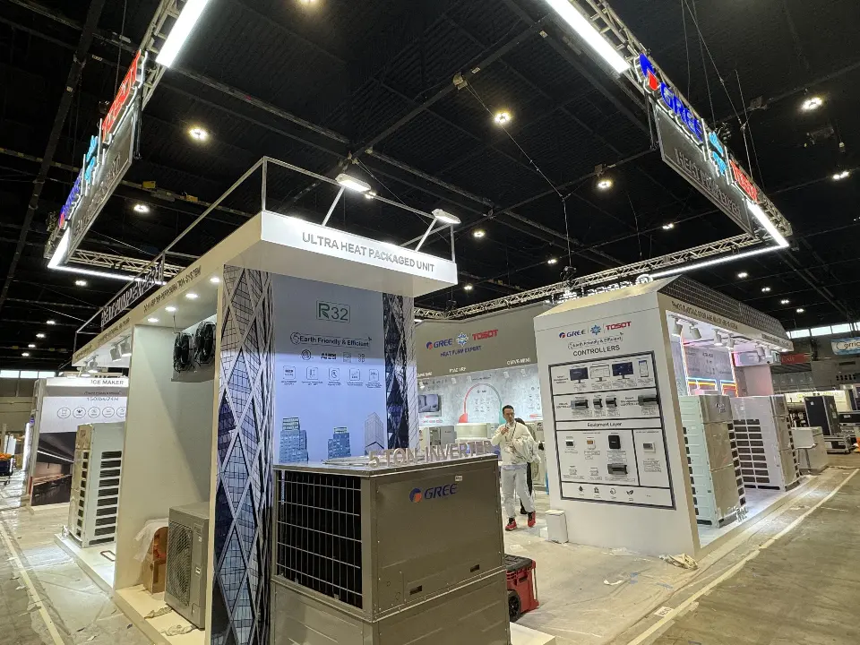 Product corner with large condensing units, mountain graphics and white walls