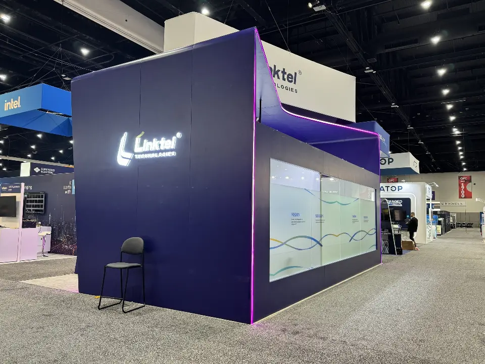Outer purple wall with lit Linktel logo and a frosted window to the side