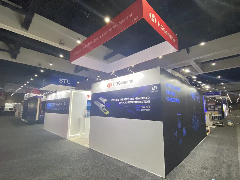 Corner view of the dark blue wall with lit edges under the red square header