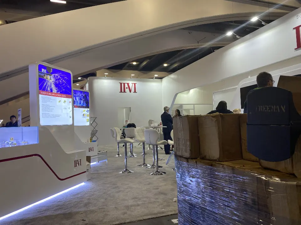 Inside view of the meeting counter and screens with packing boxes in front