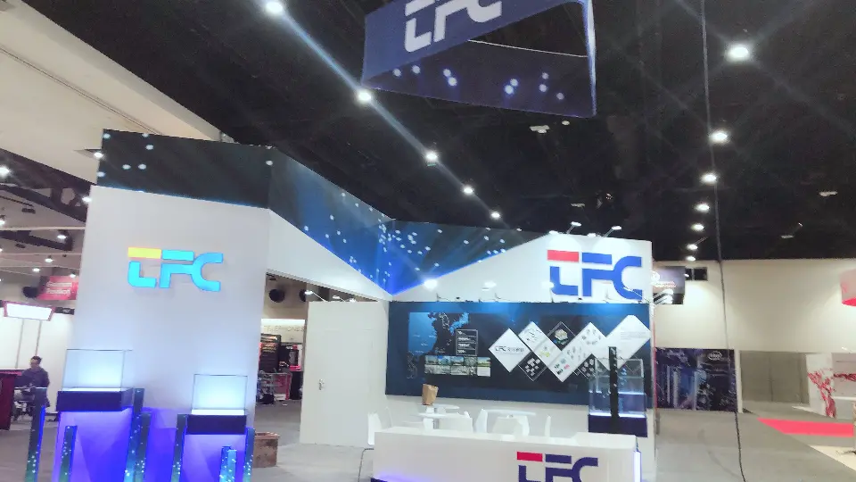 White front counter and lit display cases below the starry blue fascia