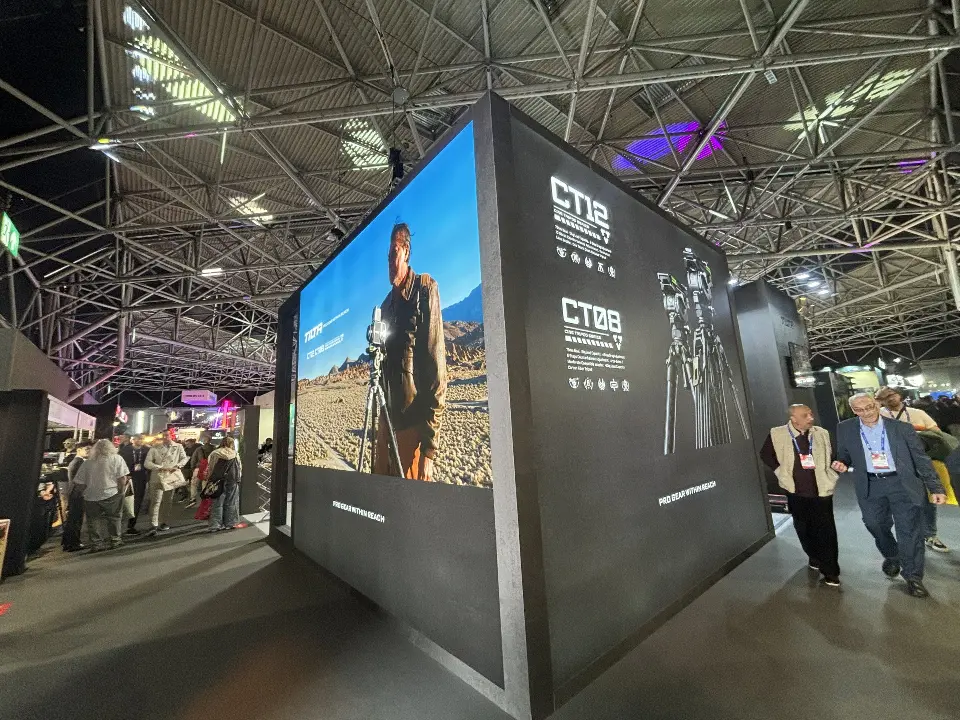 CT12 tower graphic showing a filmmaker at the booth corner