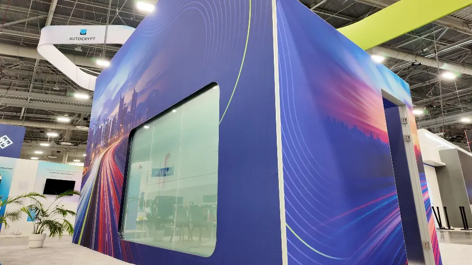Frosted glass meeting room window framed by light-trail graphics