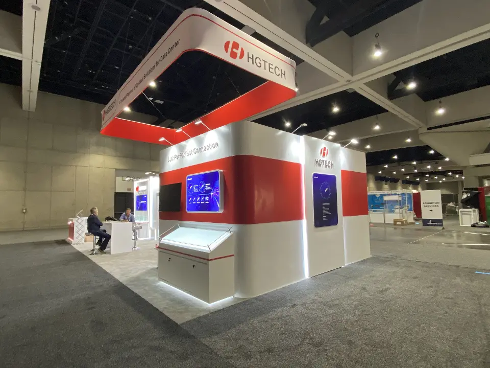 Back corner with a seating area and screens on the walls