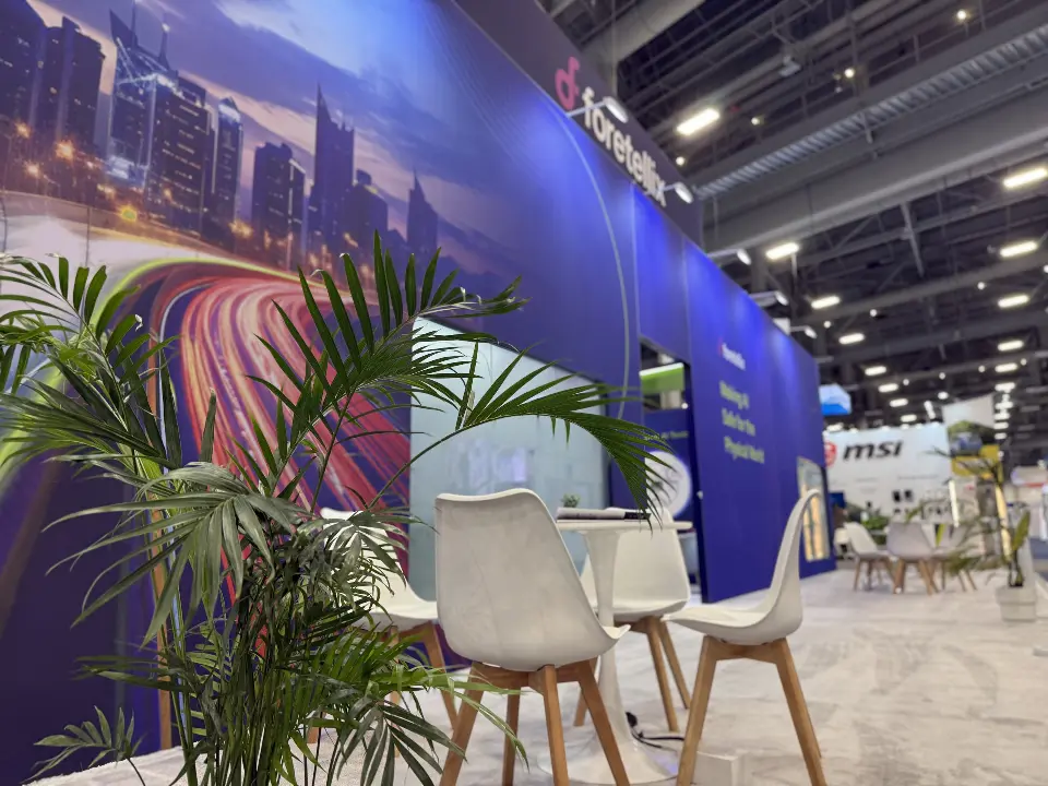 Palm, white chairs and the mural wall in landscape view