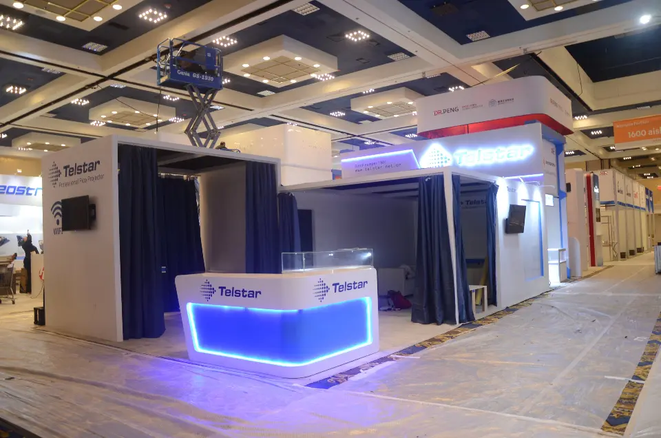 Closer view of the curved counter glowing blue at floor level