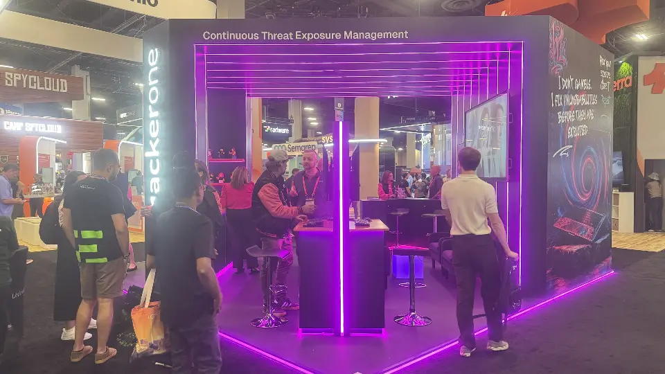 Back counter area with screen, bar stools and magenta glow on the floor