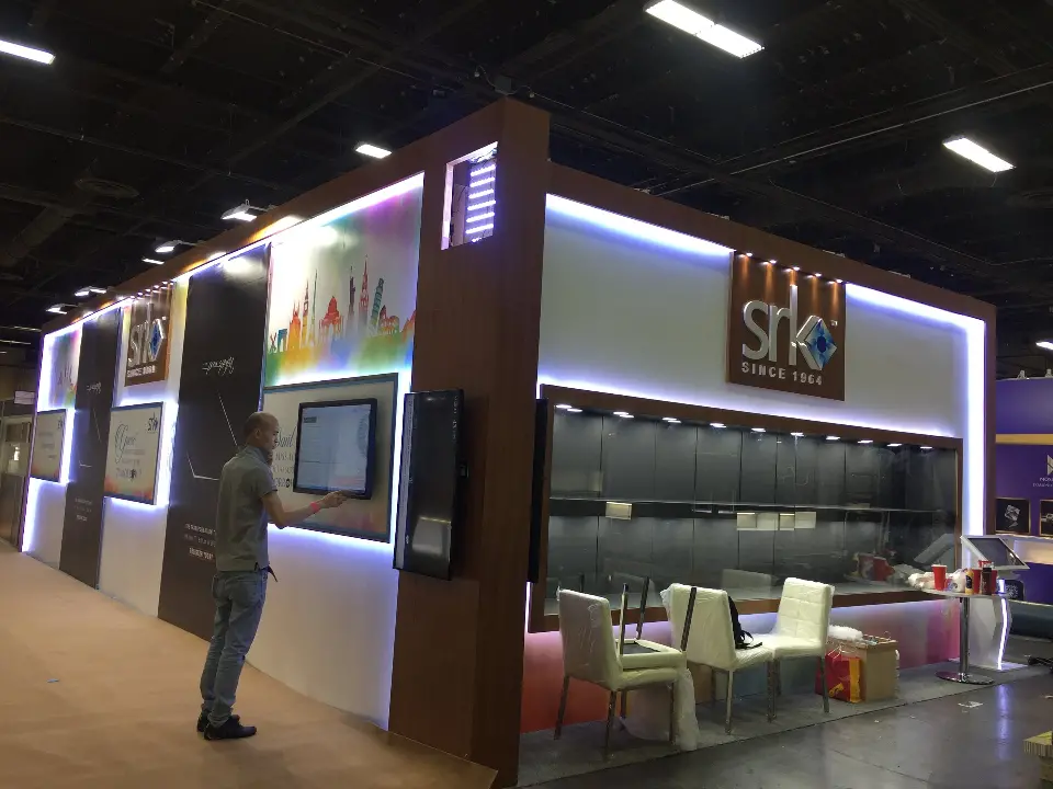Corner view showing the skyline graphic side and a wall-mounted screen