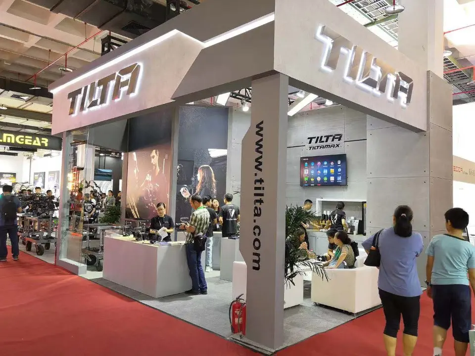Booth corner with TILTA fascia, counter screen and tilta.com lettering