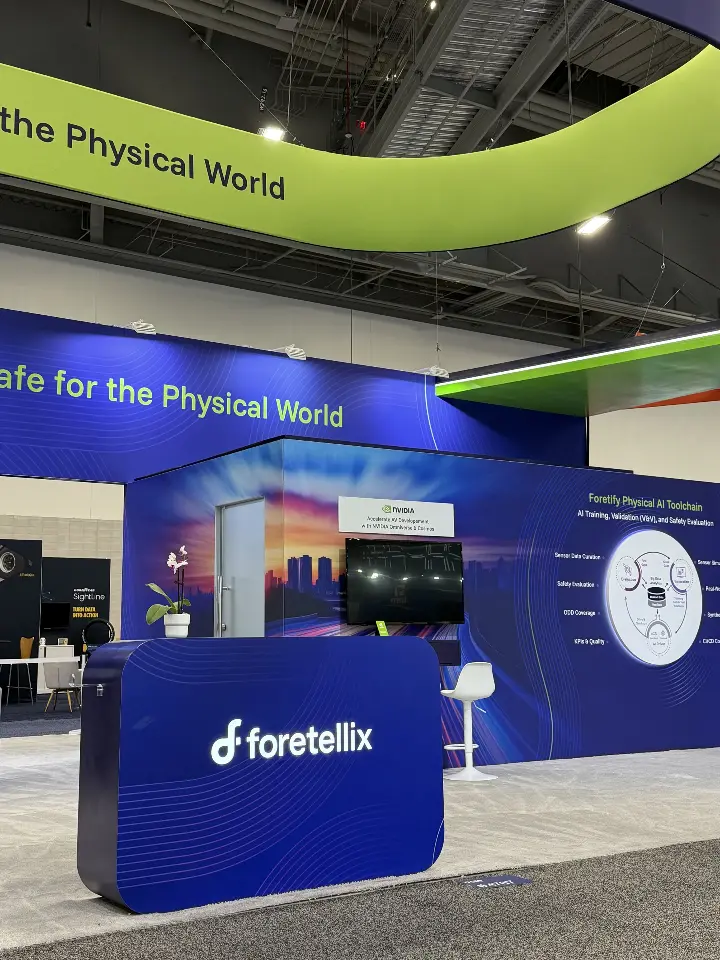 Lime-green ring sweeping above the navy welcome counter with logo