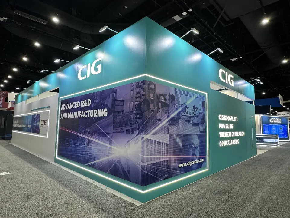 Teal corner wall with Advanced R&D and Manufacturing graphic and lit edges