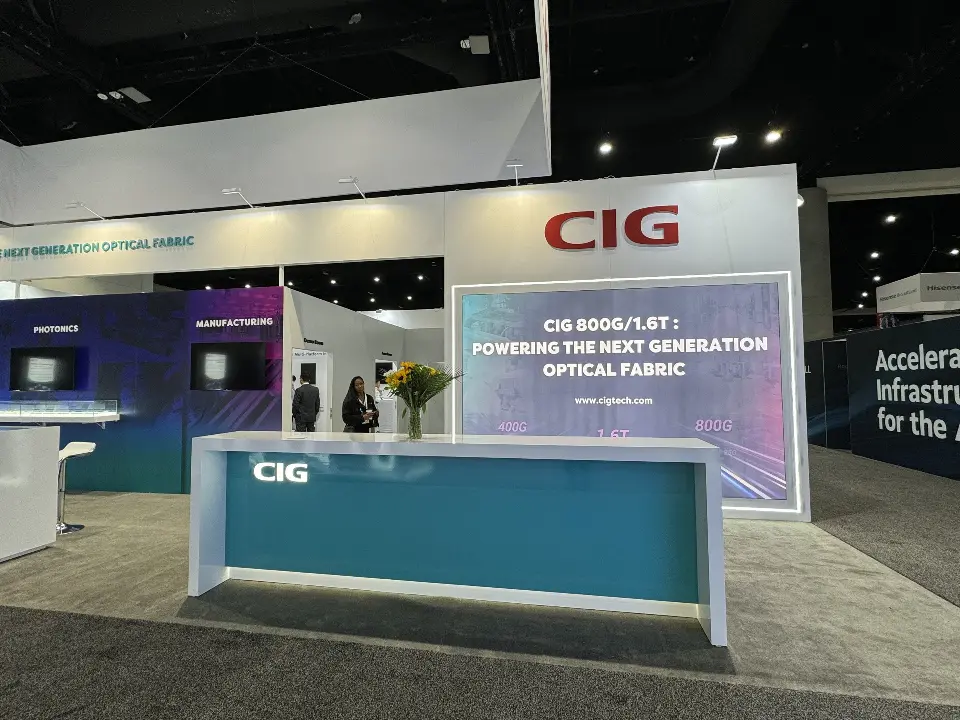 Front view of the teal CIG counter and lit-edge graphic panel under the header