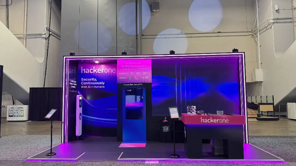 Straight front view with video screen, kiosk and pink counter