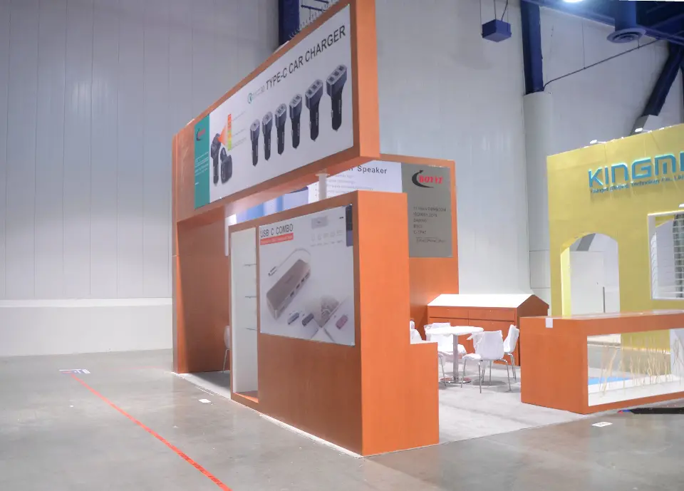 Side angle of shelving and earphone lightbox beside a neighbouring yellow booth