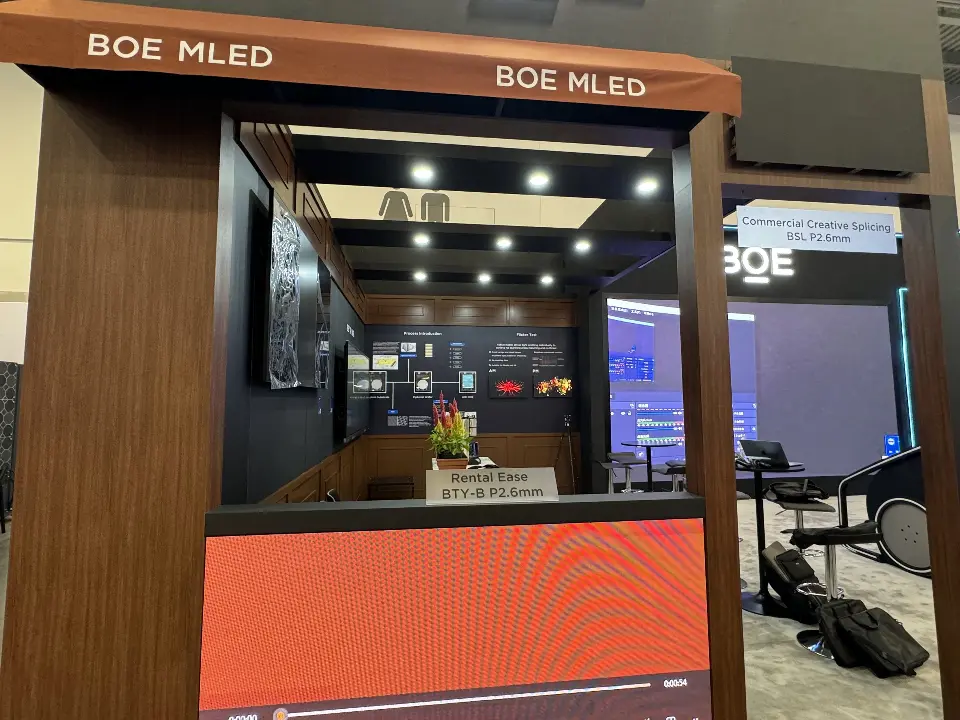 Wood-look canopy with BOE MLED signs above an orange-fronted counter