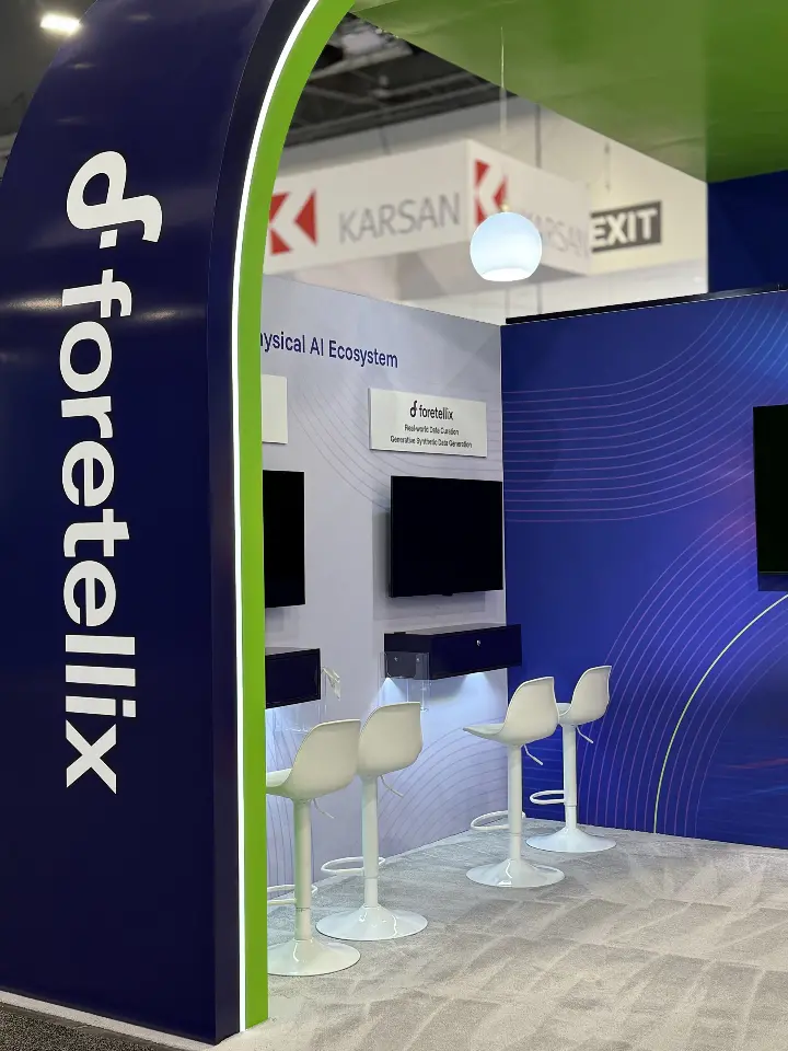 Logo column with white bar stools at the demo counter