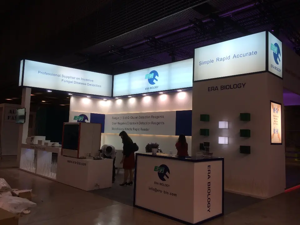 Front view of lab instruments on the counter under lit lightbox headers