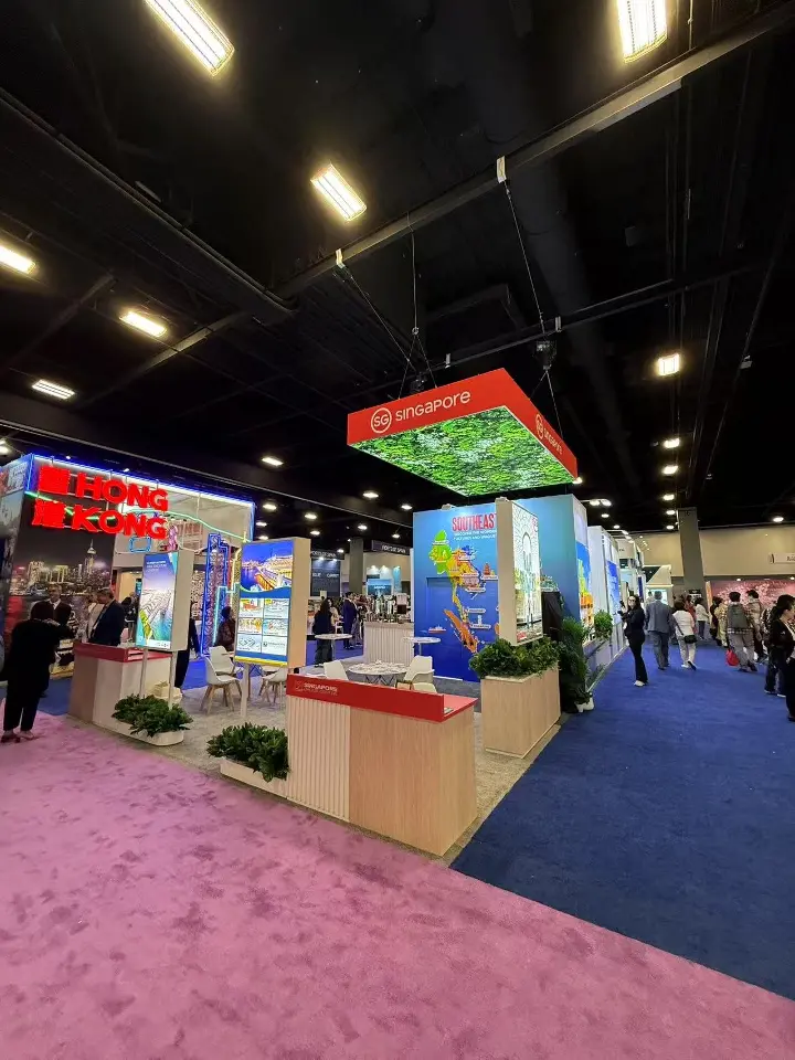 Singapore stand from the aisle with red counter and foliage canopy overhead
