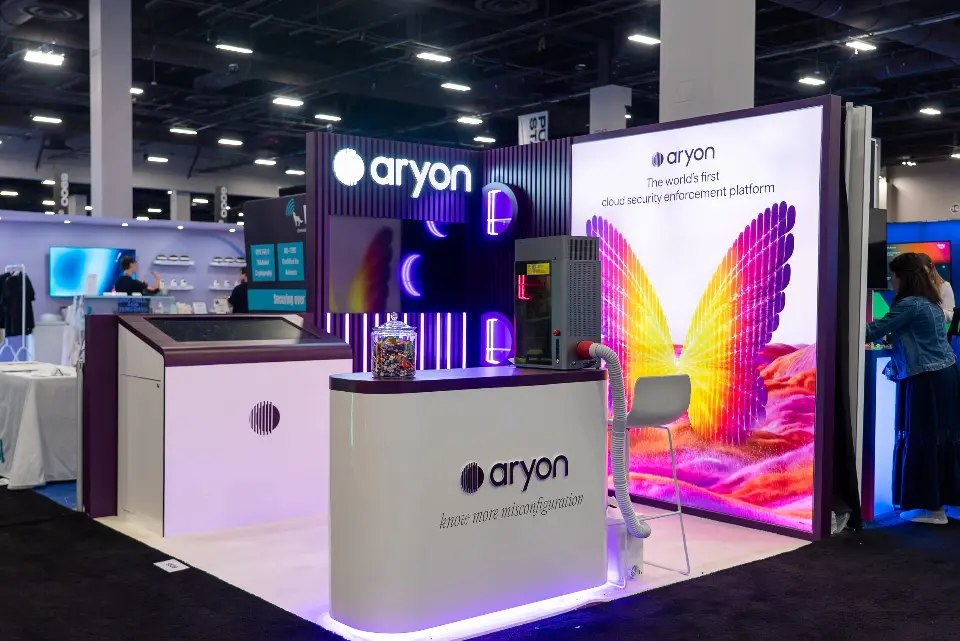 Angled view of the white Aryon counter with purple light strip and a candy jar on top