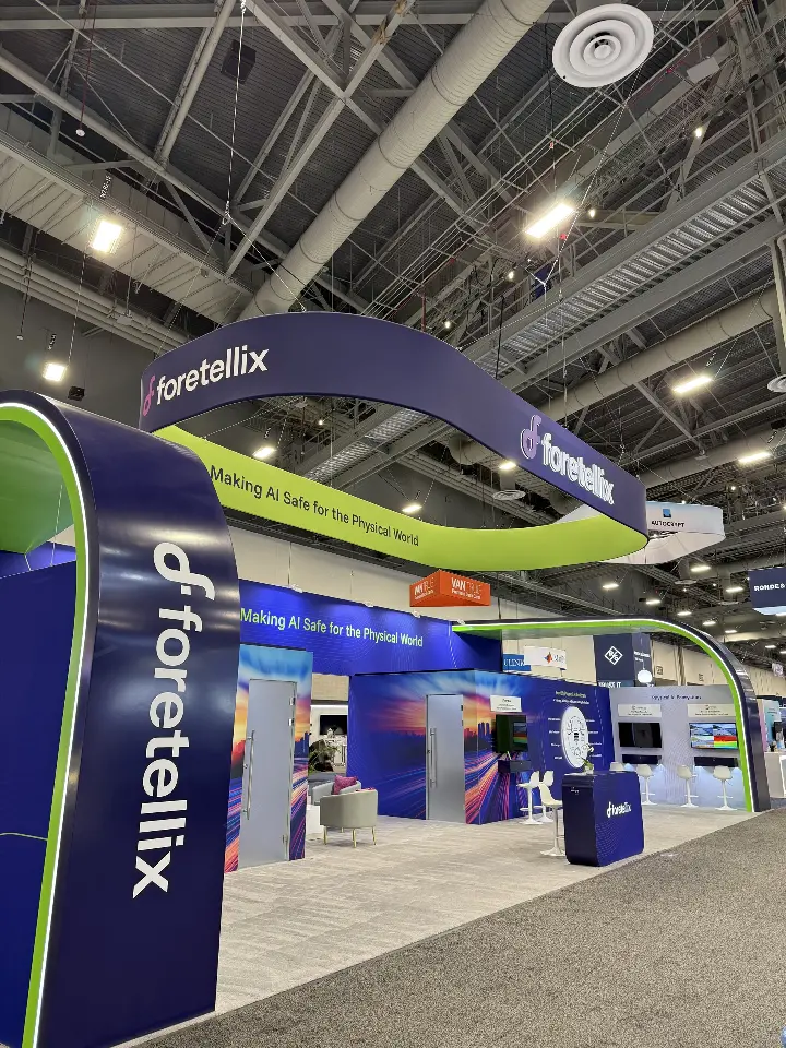 Closer look at the curved corner column and the booth side elevation