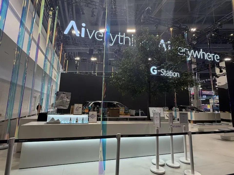 Long white counter lit at its base under the hanging strands