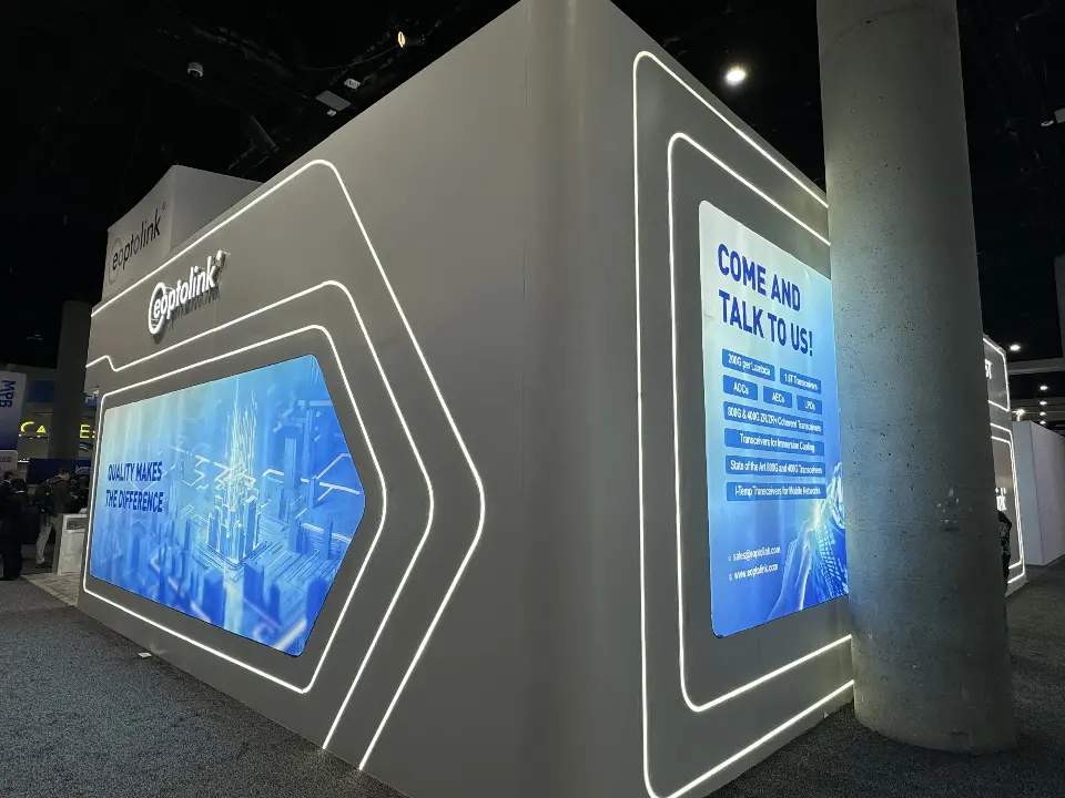 Side wall with a backlit blue graphic inside a hexagonal light-line frame