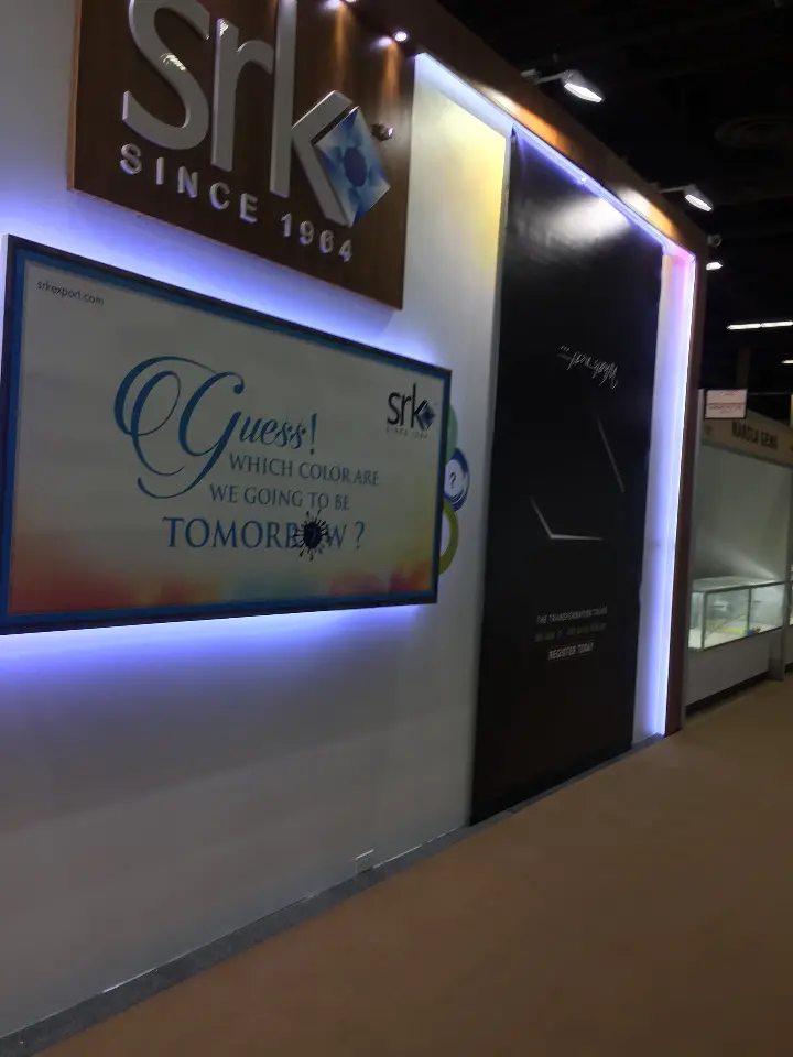 Portrait of the booth corner with lit edges and framed graphic panel