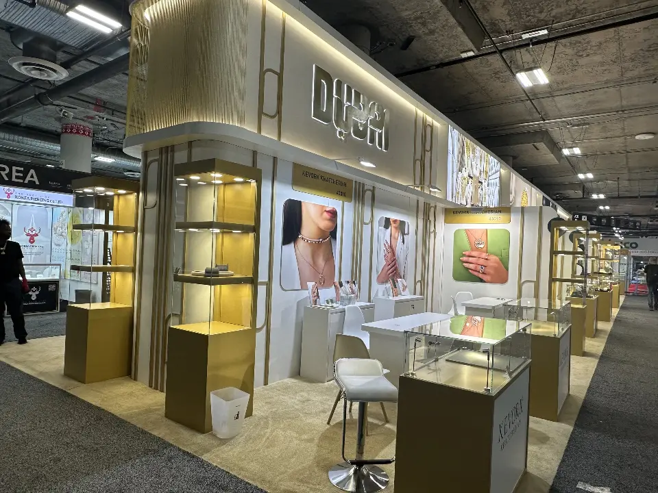Frontal view of the DUBAI fascia above a row of lit showcases