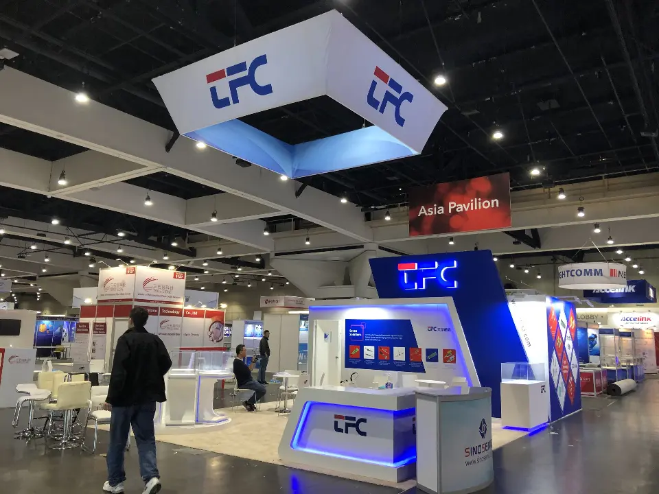 During installation: TFC angled hanging sign above the blue-lit reception counter