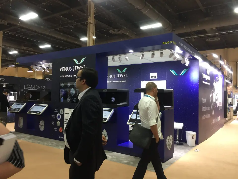 Visitors passing the Venus Jewel kiosks along the navy frontage