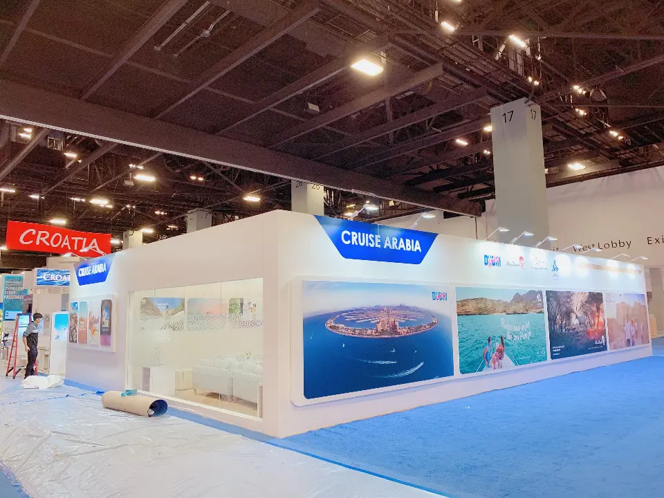 Exterior corner with a cruise ship photo graphic under the blue header