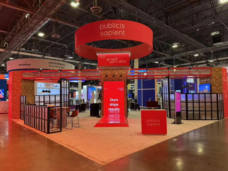 Wide straight view of the red booth with ring header and branded column