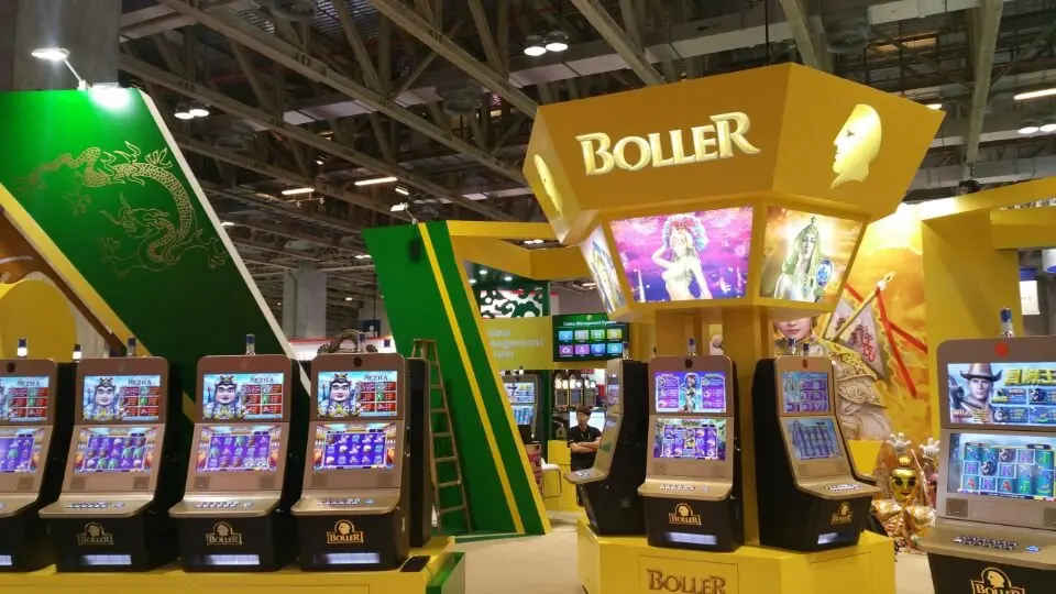 Central BOLLER tower with gold lettering above a row of slot machines