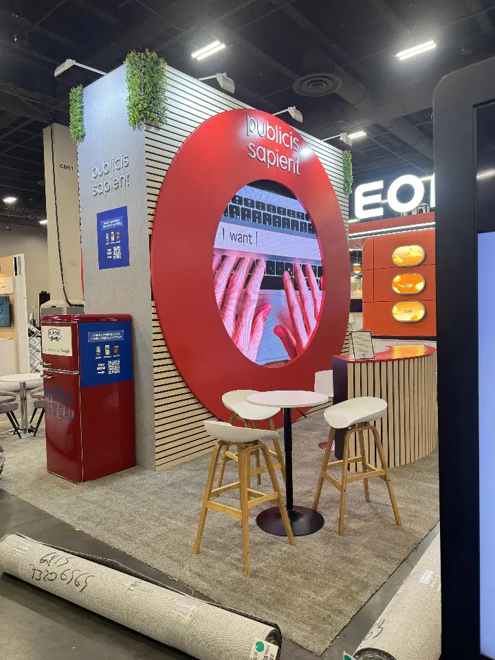 Vertical view of the red ring screen with high table and two stools
