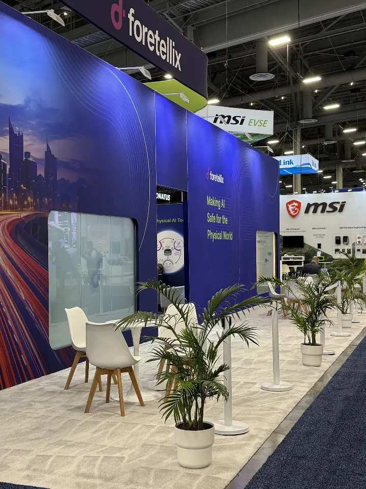 Long side wall with palms, cafe chairs and frosted window graphics