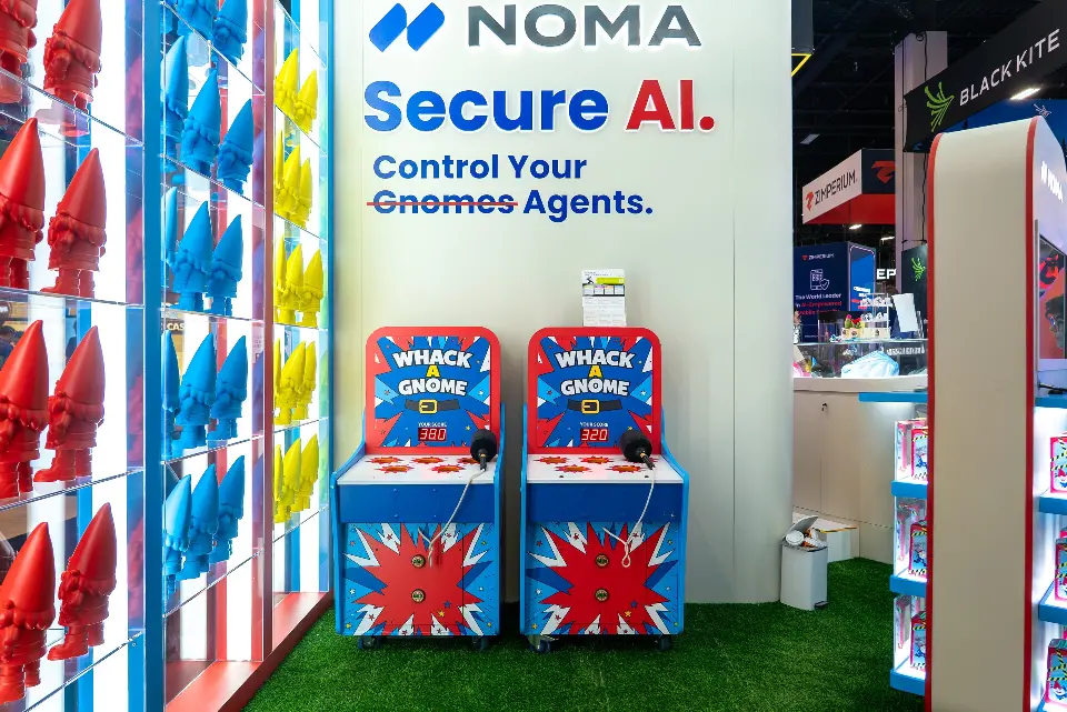 Whack a Gnome game cabinets between red and blue gnome shelf walls