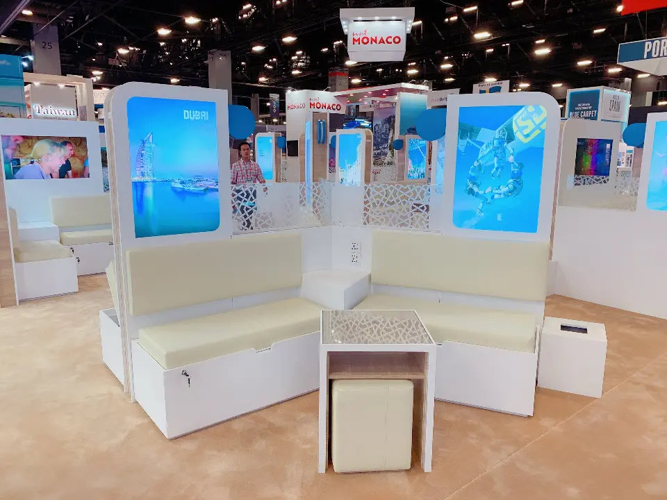 Bench pod with cream seats framed by two backlit destination panels