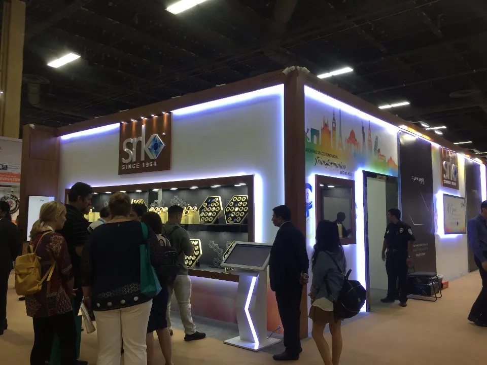Visitors gathered at the front showcase and screen kiosk