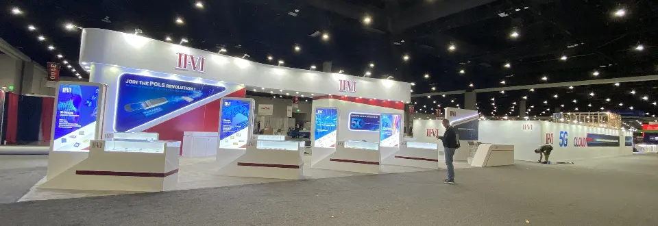 Panoramic view of kiosks and red fascia across the empty hall