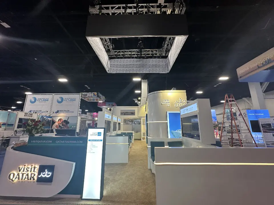 View under the hanging sign toward the lounge and white walls