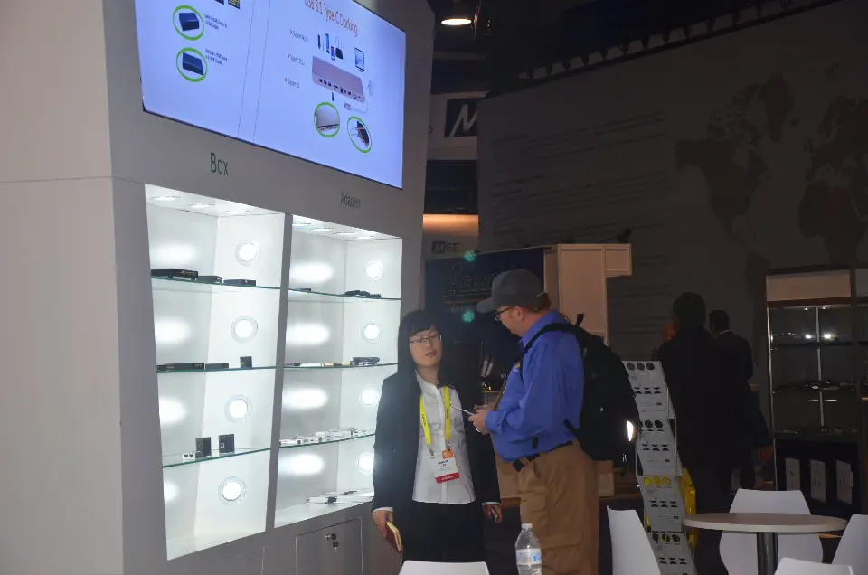 Backlit shelving cabinets with products as visitors browse