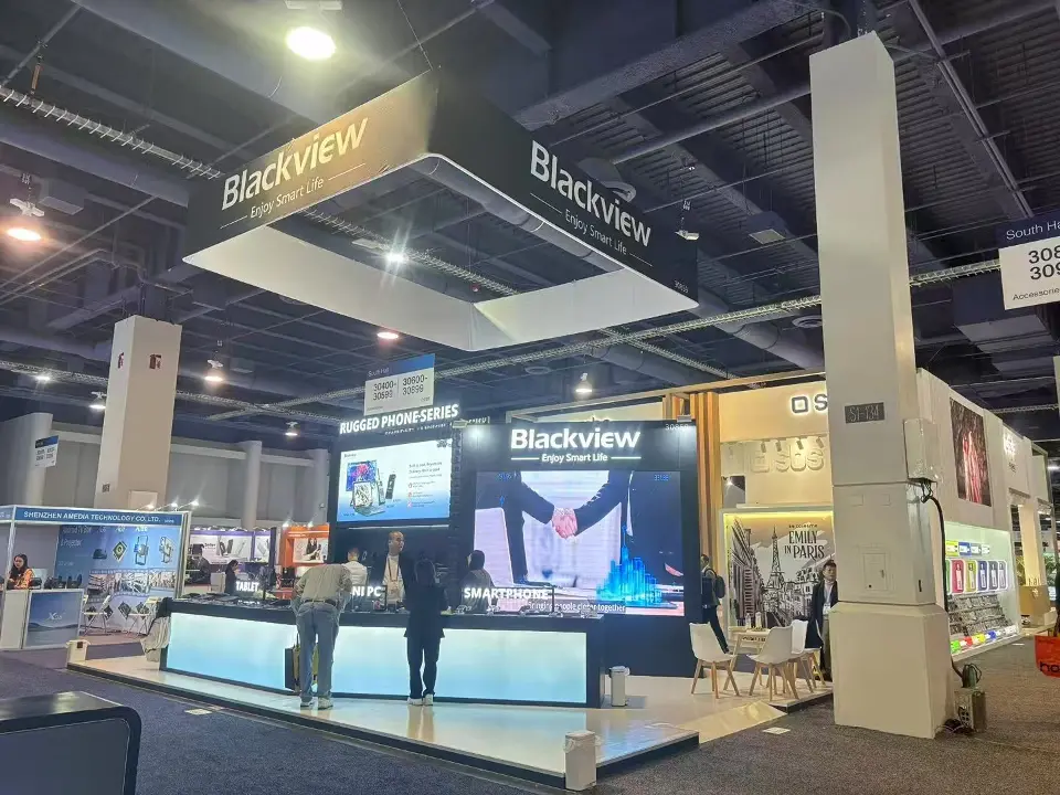 Blackview booth at CES 2025 from the aisle with a hanging Blackview banner and lit product counter
